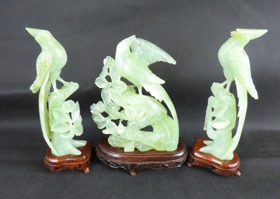 Lot 432 - A pair of Oriental jade-style exotic birds