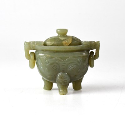 Lot 502 - A Chinese jade twin-handled lidded vessel, the...