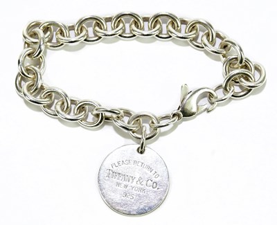 Lot 579 - TIFFANY & CO; a sterling silver bracelet with...
