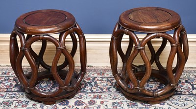 Lot 1810 - A pair of Chinese hard wood garden seats,...