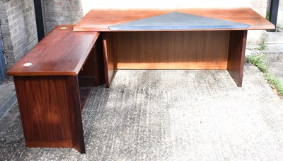 Lot 28 - A large 1970s rosewood L-shaped executive desk,...