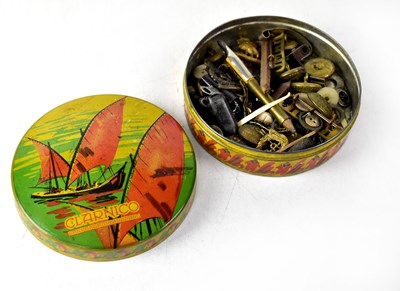 Lot 456 - A vintage Clarnico tin containing a quantity of Royal Army medical Corps buttons