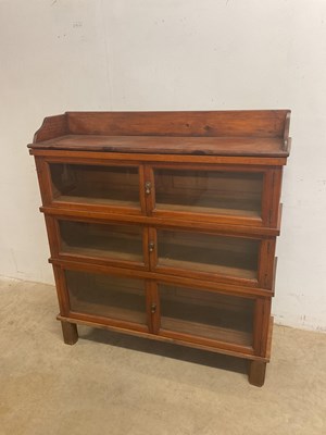 Lot 405 - A Globe Wernicke style three tier bookcase...