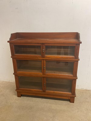 Lot 406 - A Globe Wernicke style three tier bookcase,...