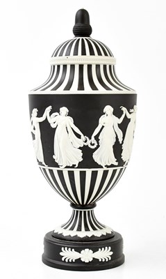 Lot 1627 - WEDGWOOD; a black basalt pedestal urn and...