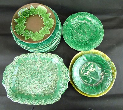Lot 223 - A quantity of 19th century green glaze pottery