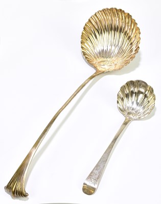 Lot 1204 - A Georgian silver soup ladle with shell shaped...