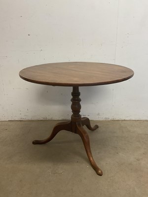 Lot 519 - A 19th century mahogany tilt-top tripod table...