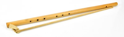 Lot 1323 - A simple wooden flute, length 70cm.