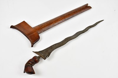 Lot 680 - An 18th/early 19th century eastern kris with...