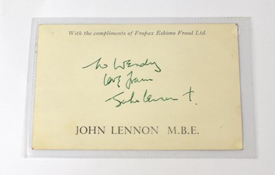 Lot 224 - JOHN LENNON; a black and white picture...