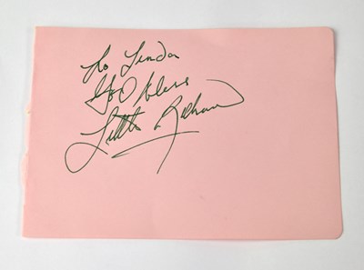 Lot 167 - LITTLE RICHARD; a torn page from an autograph...