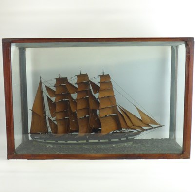 Lot 467 - A late 19th/early 20th century wooden model of a four-masted sailboat