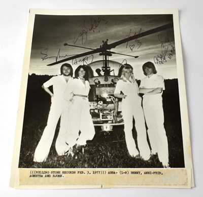 Lot 210 - ABBA; a black and white promotional photograph...