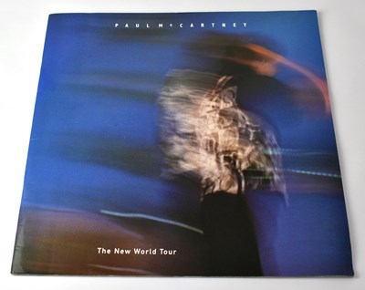 Lot 238 - PAUL MCCARTNEY; a 'New World Tour' programme,...
