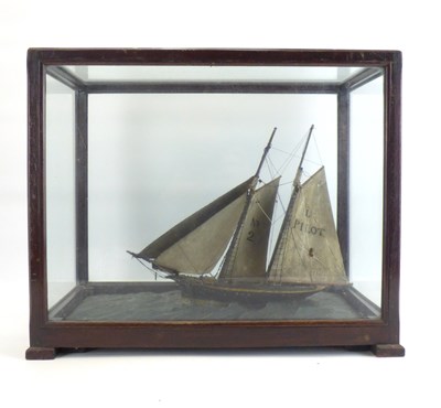 Lot 469 - A late 19th/early 20th century wooden model of a two-masted sailboat