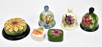 Lot 1775 - MOORCROFT; six pieces of assorted pottery to...
