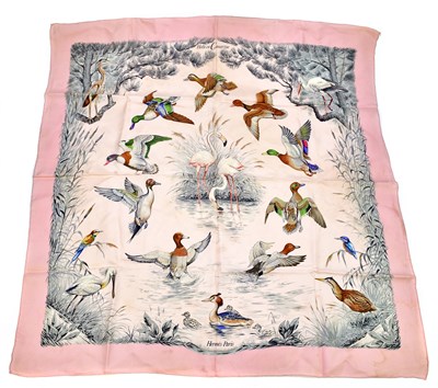 Lot 611 - HERMÈS; a pink vintage 100% silk 'Halte en...