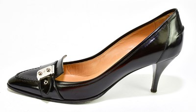 Lot 792 - HERMÈS; a pair of black leather stiletto court...