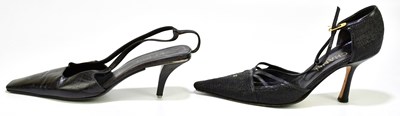 Lot 793 - CHANEL; a pair of cotton tweed and calf skin...