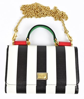 Lot 677 - DOLCE & GABBANA; a black and white striped...