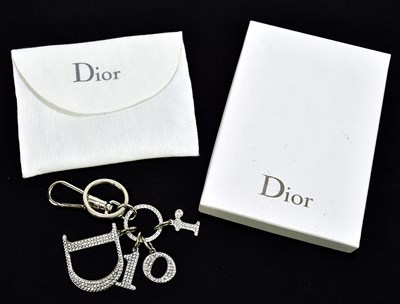 Lot 680 - CHRISTIAN DIOR; a Crystals logo bag charm key...