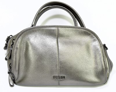 Lot 701 - GUESS; a bronze pebbled leather handbag with...