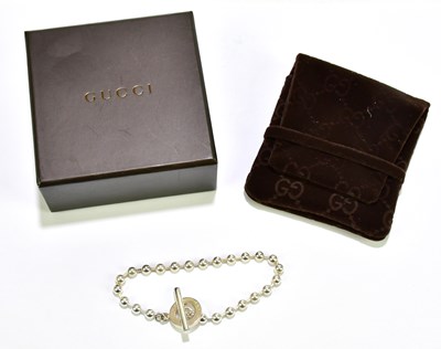 Lot 593 - GUCCI; a hallmarked silver bubble chain...