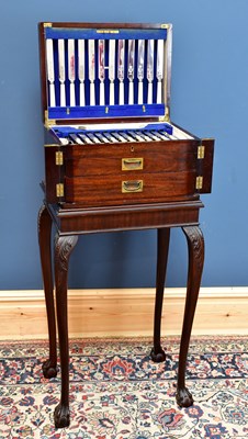 Lot 1001 - A mahogany canteen on stand with hinged cover...