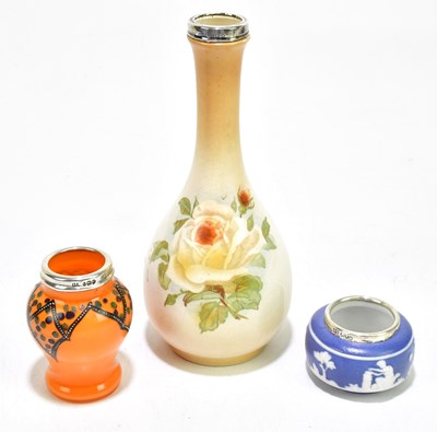 Lot 1698 - An early 20th century ceramic bud vase with...