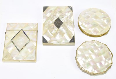 Lot 2021 - Two mother of pearl compacts, together with...
