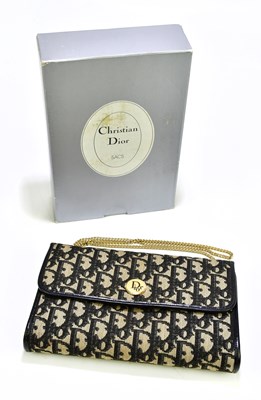 Lot 666 - CHRISTIAN DIOR; a Trotter canvas cloth...