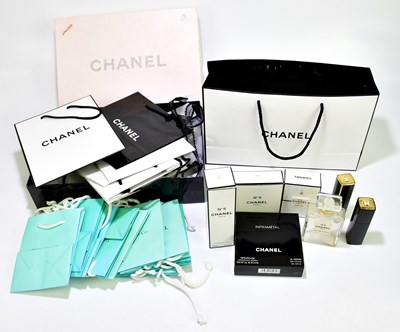 Lot 608 - CHANEL; a set containing an unused Whisper...