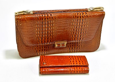 Lot 711 - PACO RABANNE; a vintage brown crocodile skin...