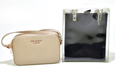 Lot 726 - TED BAKER; an unused beige pebbled leather...