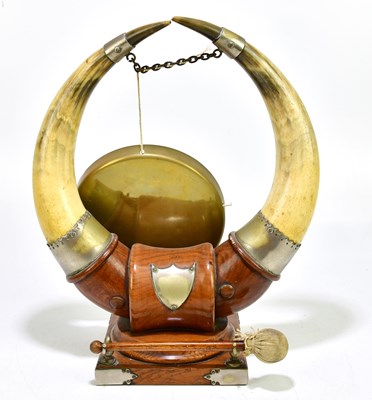 Lot 2016 - A bull horn dinner gong, on mahogany base,...