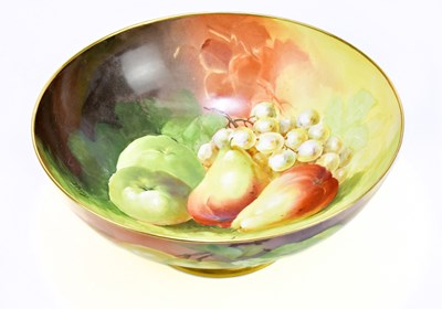 Lot 1655 - LIMOGES; a large hand painted bowl, decorated...