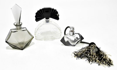 Lot 1777 - Three Art Deco glass perfume bottles, height...