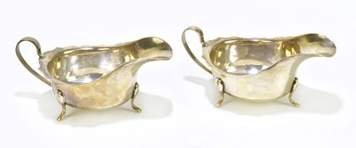 Lot 1112 - BARKER BROS SILVER LTD; a pair of George VI...