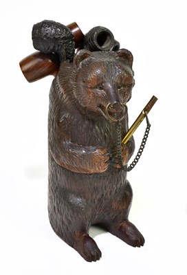 Lot 2047 - A Black Forest pipe stand modelled as a bear,...