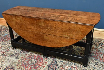 Lot 2539 - An 18th century oak gateleg dining table, 73cm...