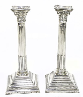 Lot 1100 - A large pair of loaded hallmarked silver...