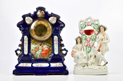 Lot 2156 - A decorative ceramic mantle clock, height 36cm,...