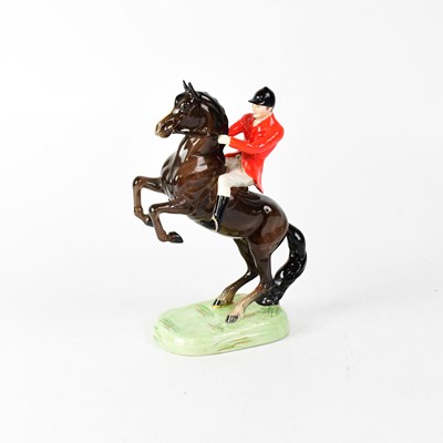 Lot 289 - BESWICK; a figure of a huntsman riding a...