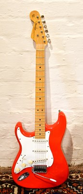 Lot 1278 - A Fender Stratocaster copy, together with soft...