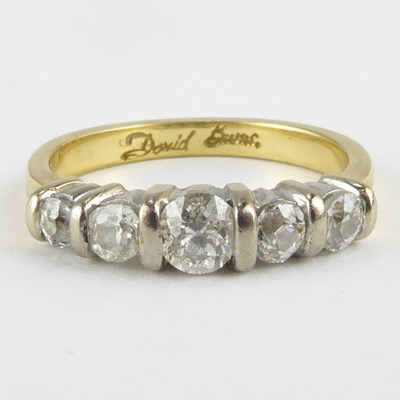 Lot 818 - An 18ct five-stone diamond ring, the five...