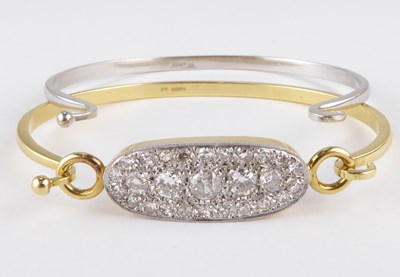 Lot 838 - An 18ct gold diamond cluster bracelet with...