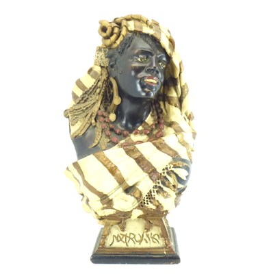 Lot 450 - A large late 19th/early 20th century plaster bust depicting an African woman