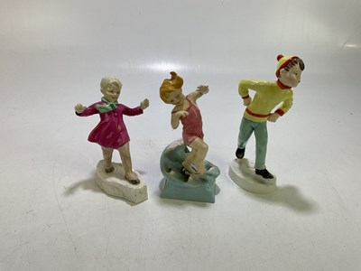Lot 1714 - ROYAL WORCESTER; three ceramic figures...