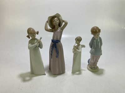 Lot 1732 - LLADRO; three ceramic figures to include a...